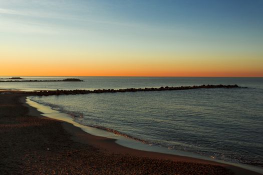 Special vision from the jetty of Marina di Massa to dawn of the new year