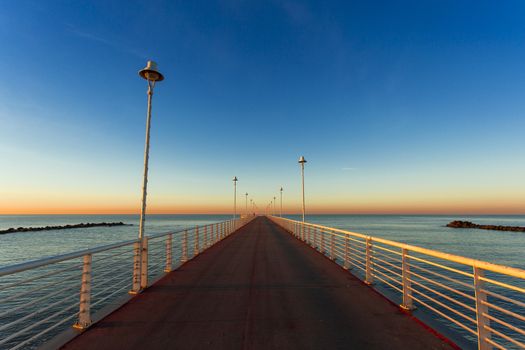 Special vision from the jetty of Marina di Massa to dawn of the new year