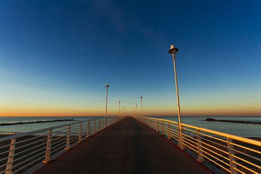 Special vision from the jetty of Marina di Massa to dawn of the new year