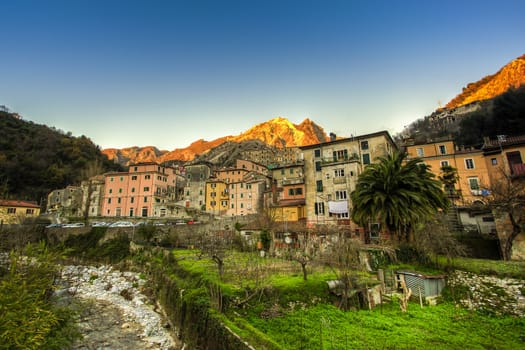 Bottom view of the village of Torano at sunset using the techinique hdr