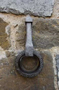 Close-up of an antique ring for tying horses