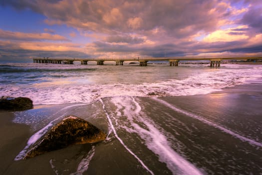 Bottom view of the sea pier in Marina di Massa using the hdr technique