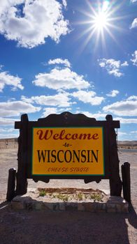 Welcome to Wisconsin road sign with blue sky