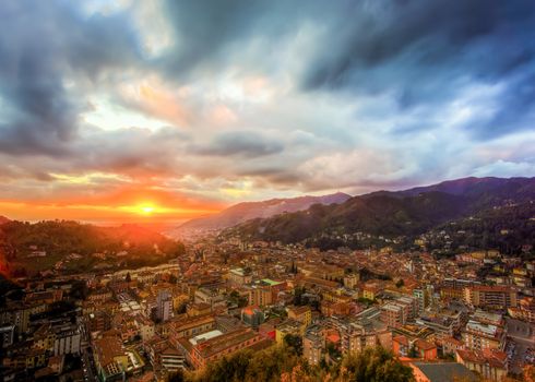 view of the city of Carrara using HDR technique at sunset