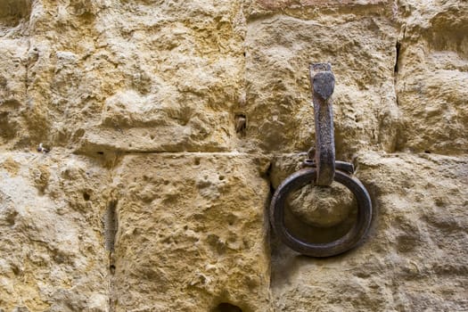 Close-up of an antique ring for tying horses