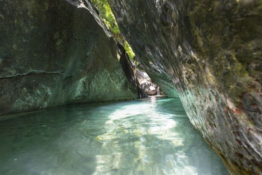 View of a cove in the rock and a natural pool source of the river Frigido