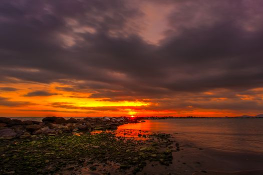 View of the sunset in Marina di Massa using the technique hdr