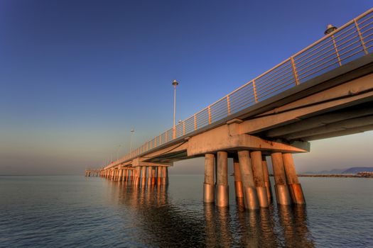 Bottom view of the sea pier in Marina di Massa using the hdr technique