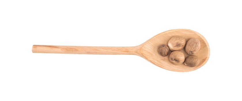 Nutmeg in wooden spoon