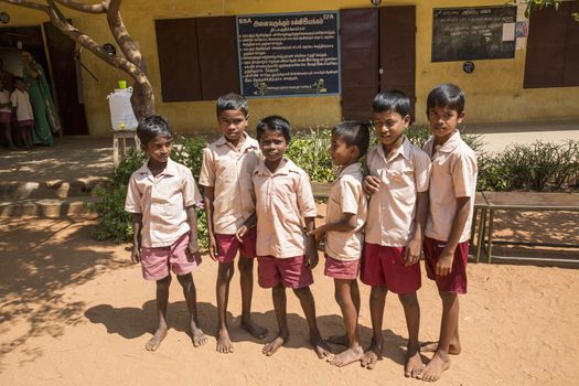 Documentary image. Pondicherry, Tamil Nadu,India - May 12 2014. School students in school, out school, in groups, with uniforms. In government school