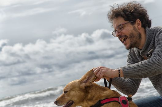 View of man playing with the dog