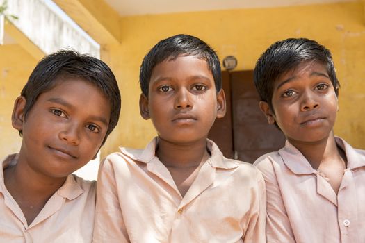 Documentary image. Pondicherry, Tamil Nadu,India - May 12 2014. School students in school, out school, in groups, with uniforms. In government school