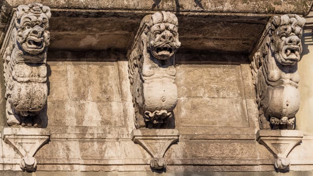 The detail of a baroque balcony in sicily