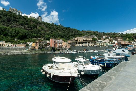 View of Sea port, boats and houses at Acireale - Italy.