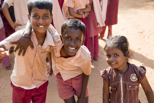 Documentary image. Pondicherry, Tamil Nadu,India - May 12 2014. School students in school, out school, in groups, with uniforms. In government school