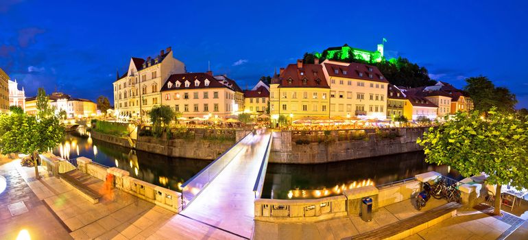 Evening panorama of Ljubljana river, architecture and castle, capital of Slovenia