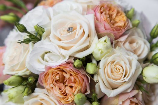 Close-up view of a bridal bouquet made of roses pale roses