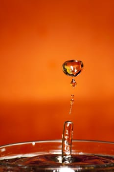 drop of water that returns to form a column