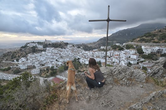 Woman and dog at one of the Pueblos blancos