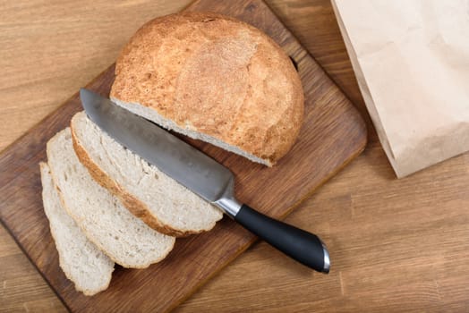 grain bread is sliced on the Board