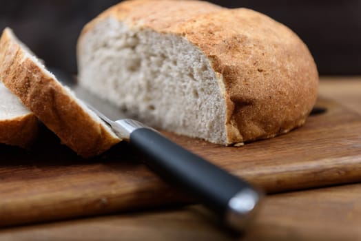 grain bread is sliced on the Board