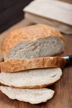 grain bread is sliced on the Board