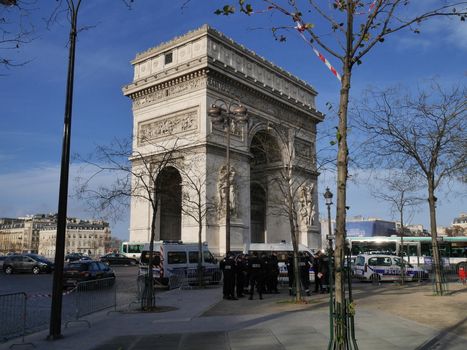 FRANCE, Paris : Police patrol the streets ahead of New Year's celebrations on the Champs-Elysees avenue in Paris on December 31, 2015. 