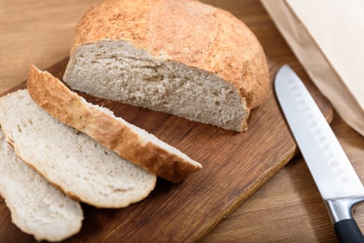 grain bread is sliced on the Board