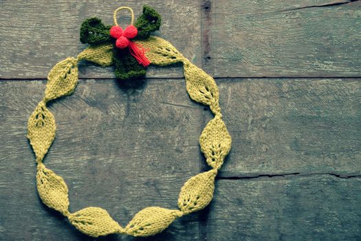 Diy Christmas wreath for decoration the door on Xmas holiday, a traditional festive in winter,  wreath make from knitted green leaf