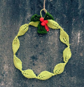 Diy Christmas wreath for decoration the door on Xmas holiday, a traditional festive in winter,  wreath make from knitted green leaf
