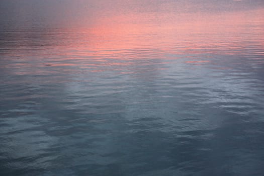 Reflex of sunset in the water surface