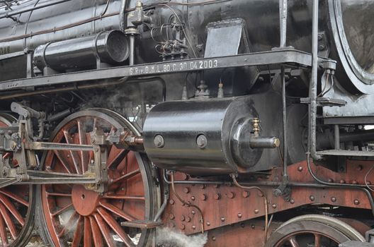 View of wheels of steam locomotive