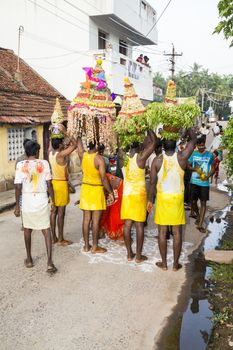 Pondicherry, Tamil Nadu,India - May 15, 2014 : each year in villages, people celebrate the temple fest, for the full day. They walk in groups, they launch paint on people, play music.