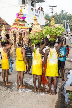 Pondicherry, Tamil Nadu,India - May 15, 2014 : each year in villages, people celebrate the temple fest, for the full day. They walk in groups, they launch paint on people, play music.