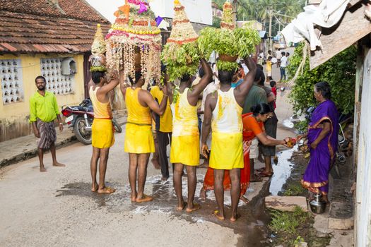 Pondicherry, Tamil Nadu,India - May 15, 2014 : each year in villages, people celebrate the temple fest, for the full day. They walk in groups, they launch paint on people, play music.