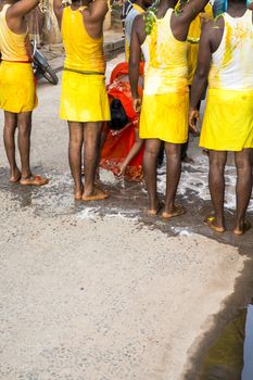 Pondicherry, Tamil Nadu,India - May 15, 2014 : each year in villages, people celebrate the temple fest, for the full day. They walk in groups, they launch paint on people, play music.