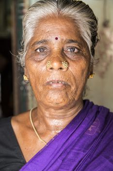 Pondicherry, Tamil Nadu,India - May 15, 2014 : each year in villages, people celebrate the temple fest, for the full day. They walk in groups, they launch paint on people, play music.