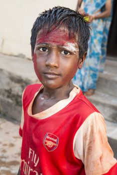 Pondicherry, Tamil Nadu,India - May 15, 2014 : each year in villages, people celebrate the temple fest, for the full day. They walk in groups, they launch paint on people, play music.