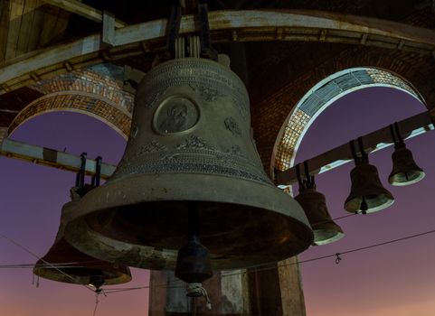 Night view at the full moon of the bells at the Cathedrals’ belfry in Penza, Russia