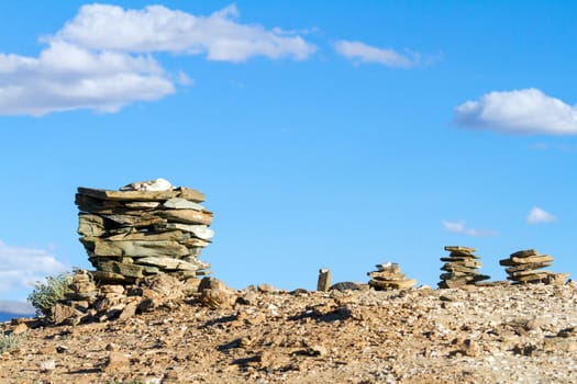 Small Buddhist stupas, collected in the form of a stack of zen stones in the vicinity of the Tso Moriri lake (Himalayas, Ladakh, India)