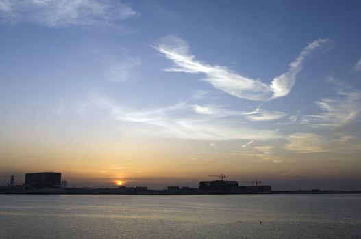 Manama cityscape at sunset with beautiful clouds