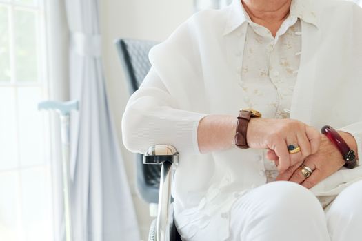 image of elderly woman in wheelchair close up