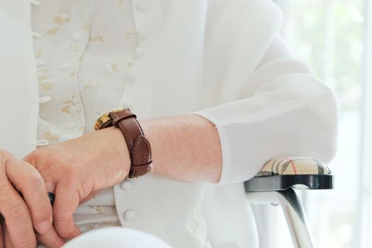 image of elderly woman in wheelchair close up