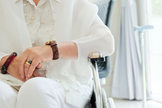 image of elderly woman in wheelchair close up