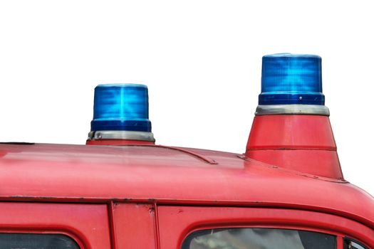 Two flashing blue lights on a fire truck.