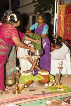 Pondicherry, Tamil Nadu, India - May 11, 2014 : Once month before birth of the baby, families celebrate the soon birth, with village people, offerings, ceremony, gifts