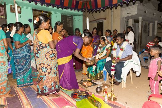 Pondicherry, Tamil Nadu, India - May 11, 2014 : Once month before birth of the baby, families celebrate the soon birth, with village people, offerings, ceremony, gifts