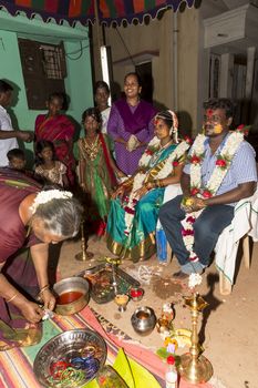 Pondicherry, Tamil Nadu, India - May 11, 2014 : Once month before birth of the baby, families celebrate the soon birth, with village people, offerings, ceremony, gifts