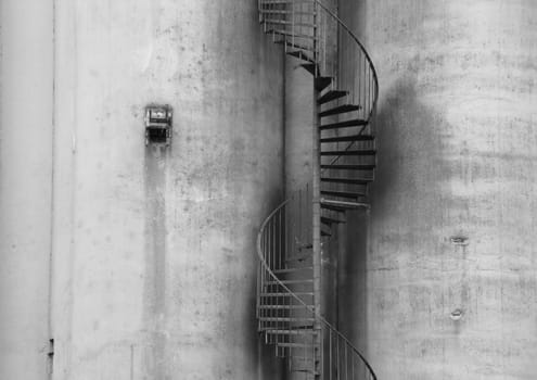 Abstract Closeup of Outdoor Metal Staircase on Concrete Grey Wall