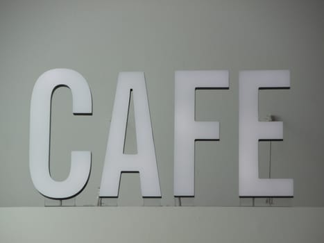 White 3D Cafe Sign Letters Mounted Secure with Wires